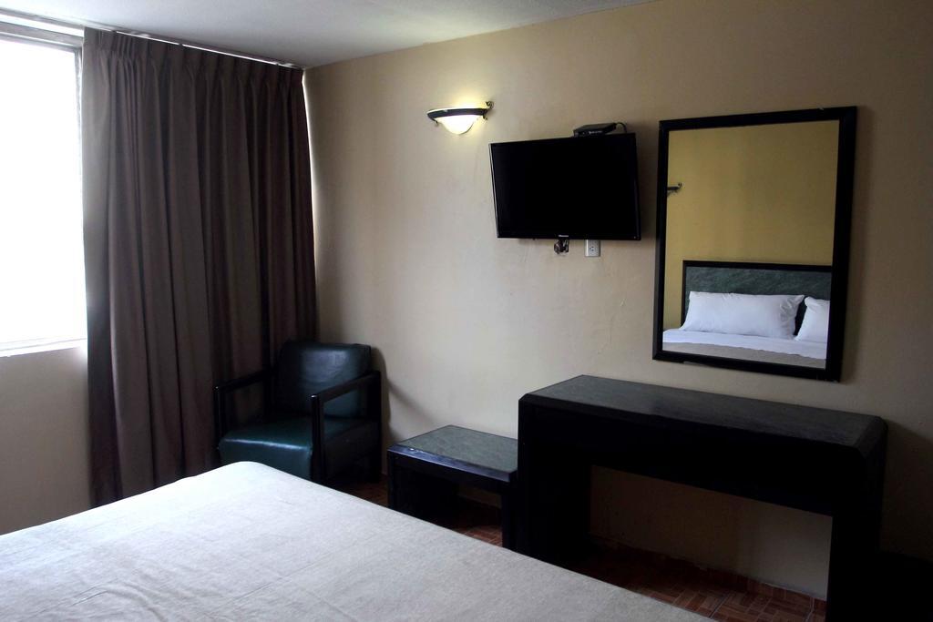 Hotel Universo Guadalajara Quarto foto