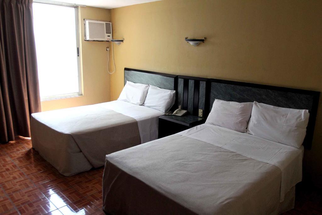 Hotel Universo Guadalajara Quarto foto